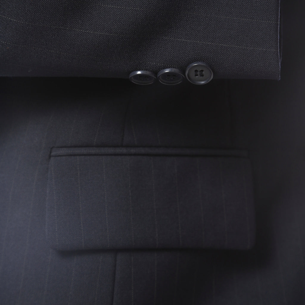 Navy pinstripe wool-blend blazer with notch lapel and three-button closure