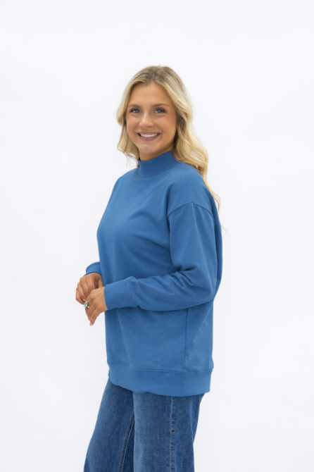 Navy mock neck sweatshirt with ribbed hem and cuffs