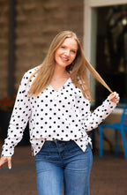 Black polka dot V-neck collared pullover with long sleeves