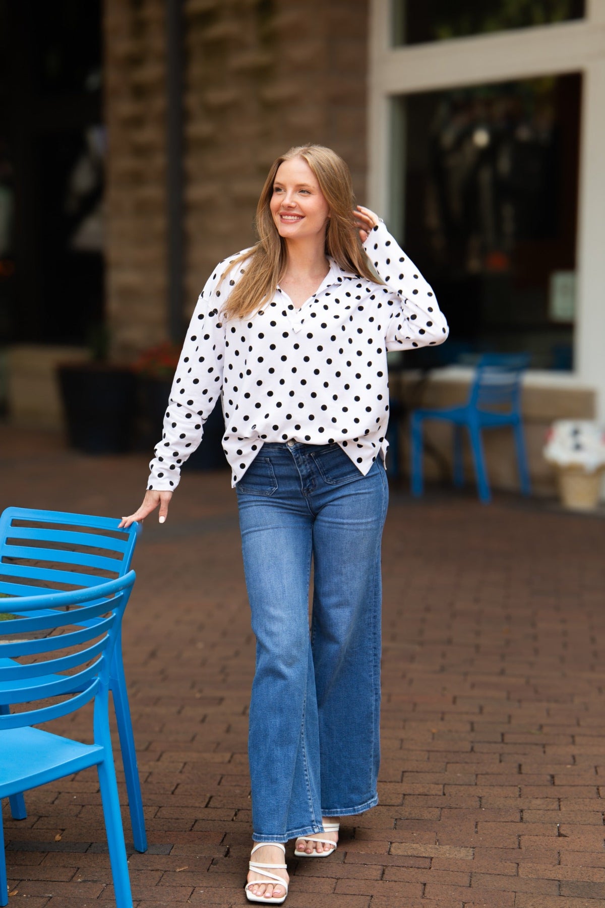 Black polka dot V-neck collared pullover with long sleeves